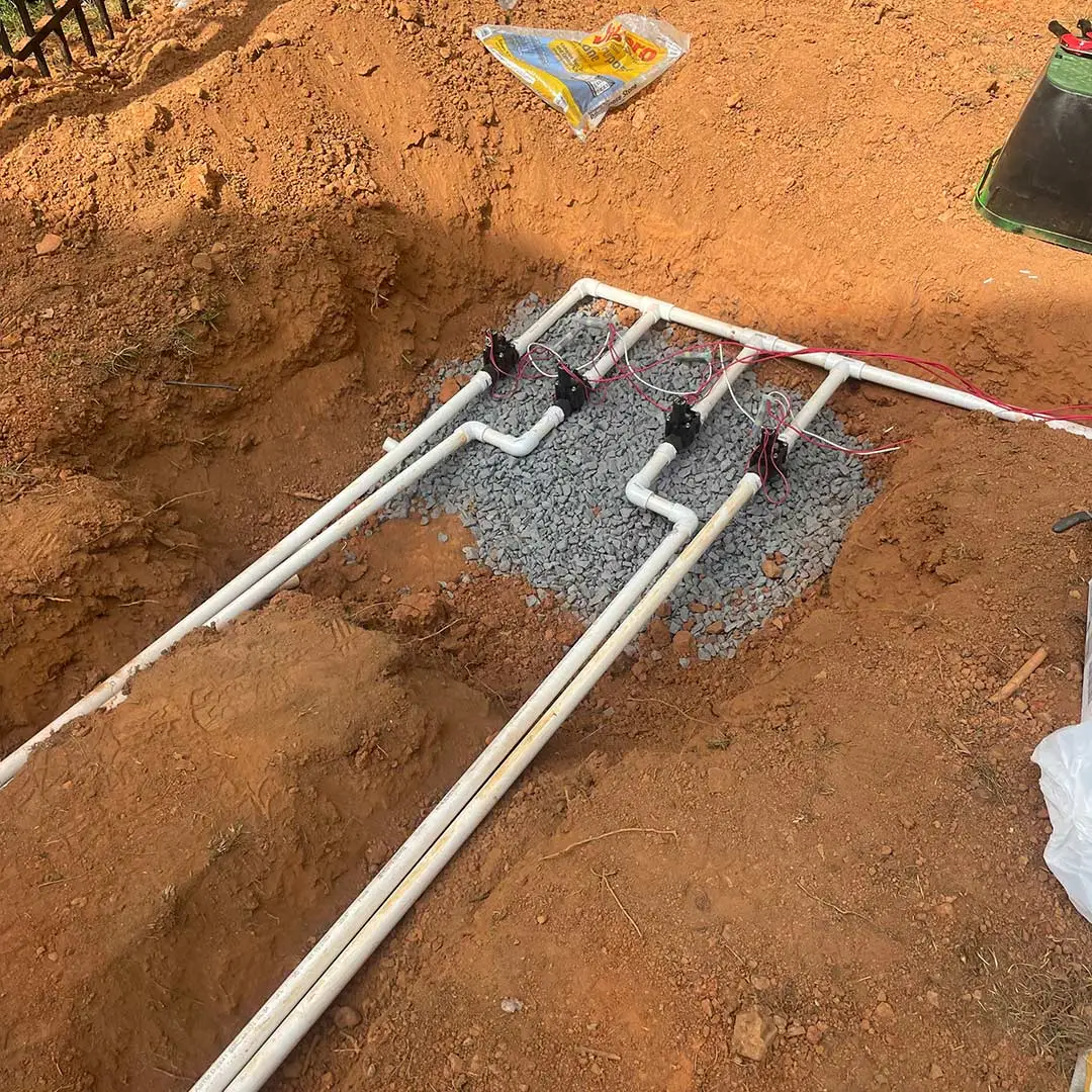A new irrigation system is being installated underground, pipes and wires being layed in Matthews, NC.