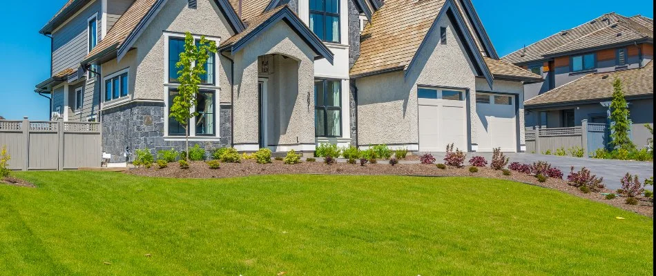 A vibrant, green lawn on a property in Matthews, NC.