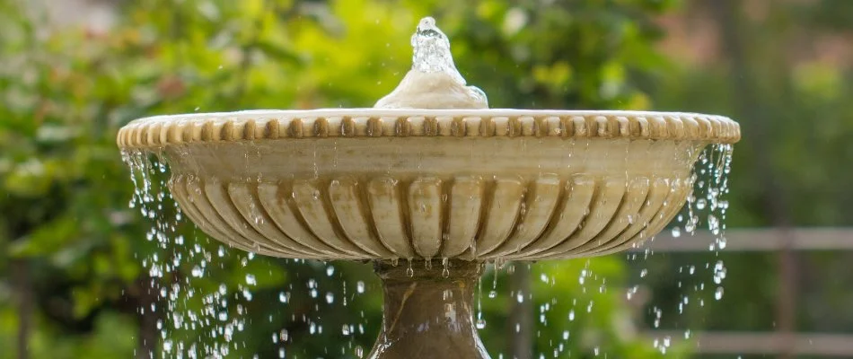 A fountain with water on a property in Matthews, NC.