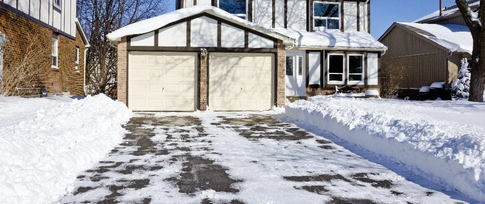 Snow cleared on the driveway of a house in Red Cross, NC.