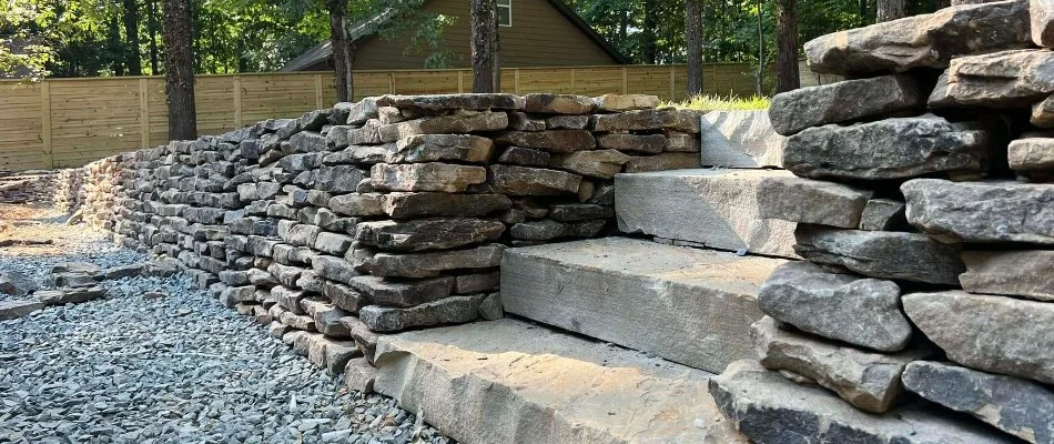 Stone retaining wall with large steps.